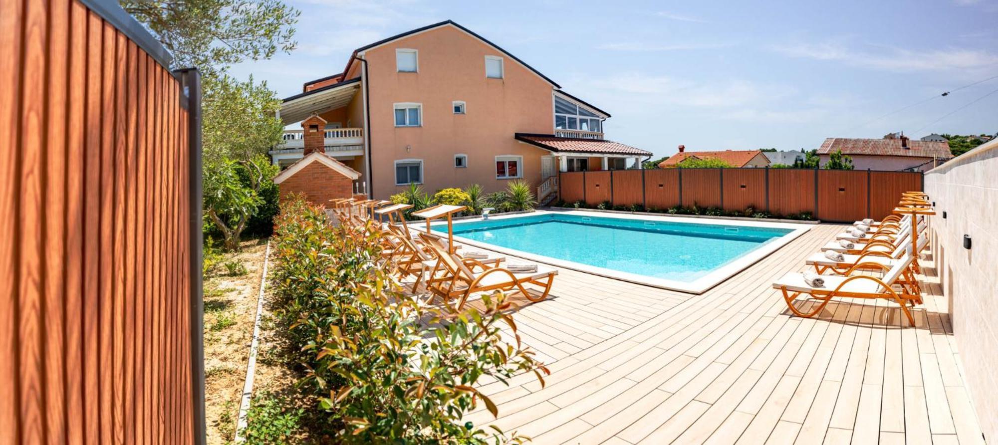Foric Apartments With Outdoor Heated Pool Rab Town Bagian luar foto